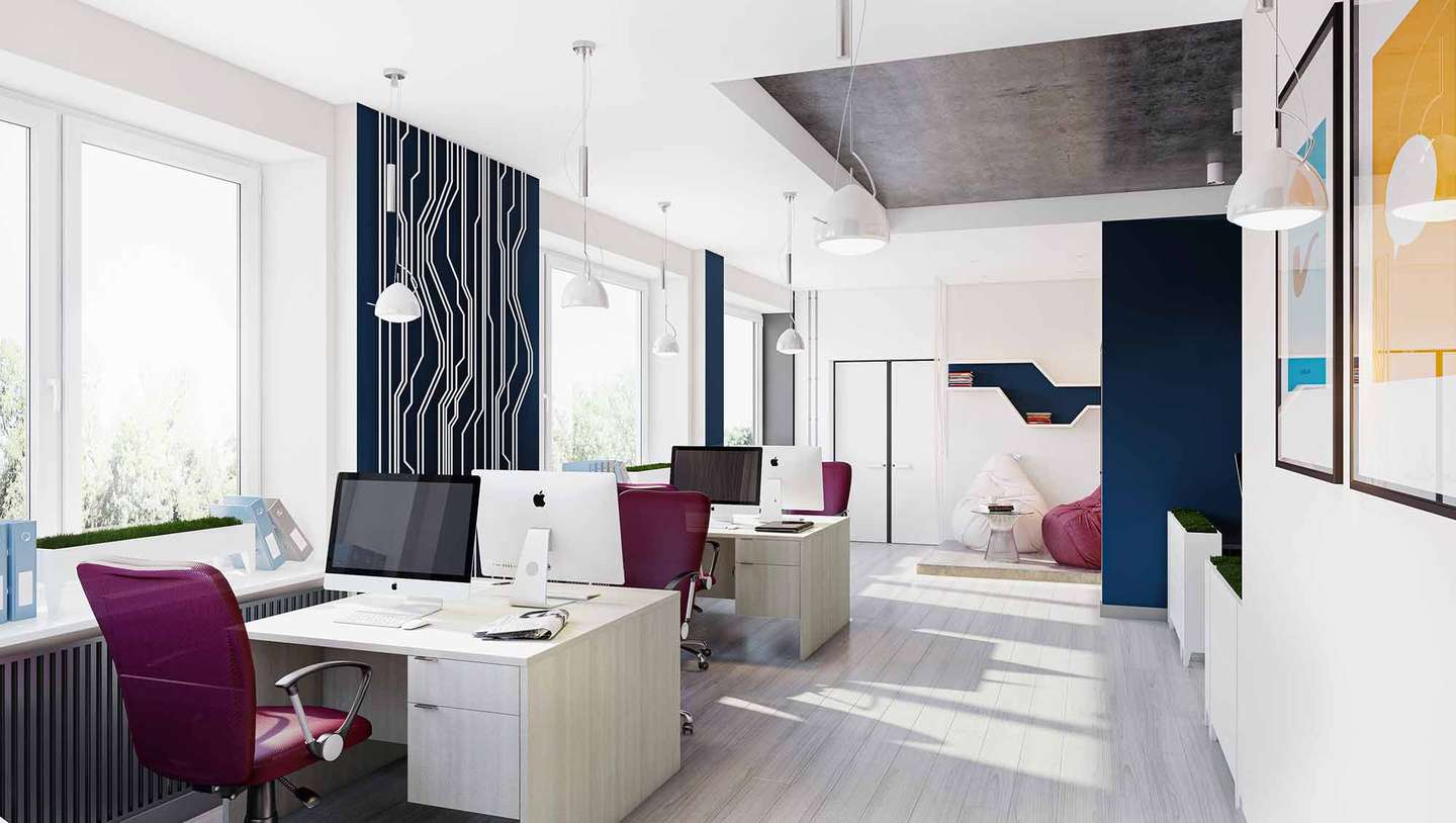 Open office with desks and bright magenta task chairs