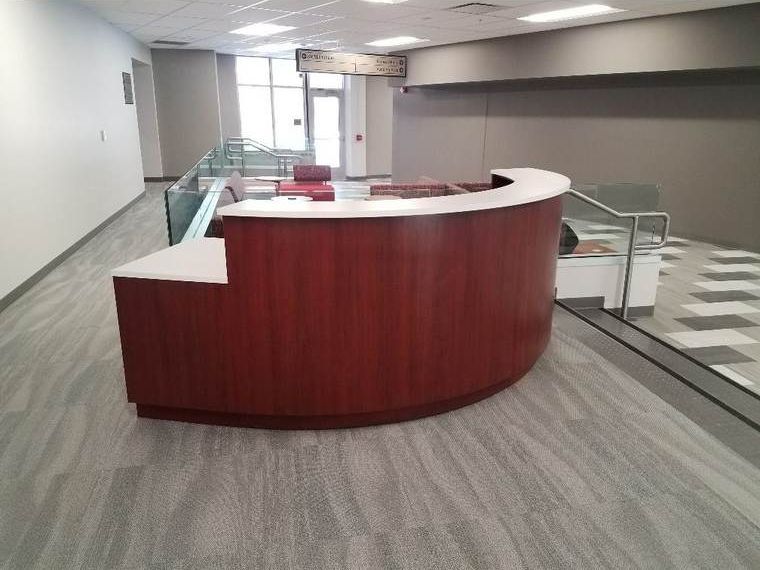 Curved Reception Desk – Curved counter in a custom finish.